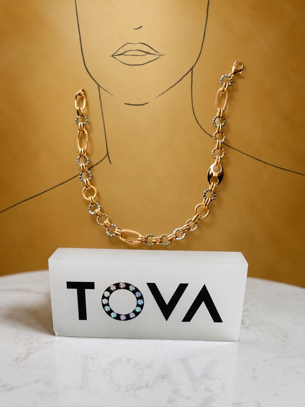 TOVA RENO Gold Link Necklace with Crystal Accents